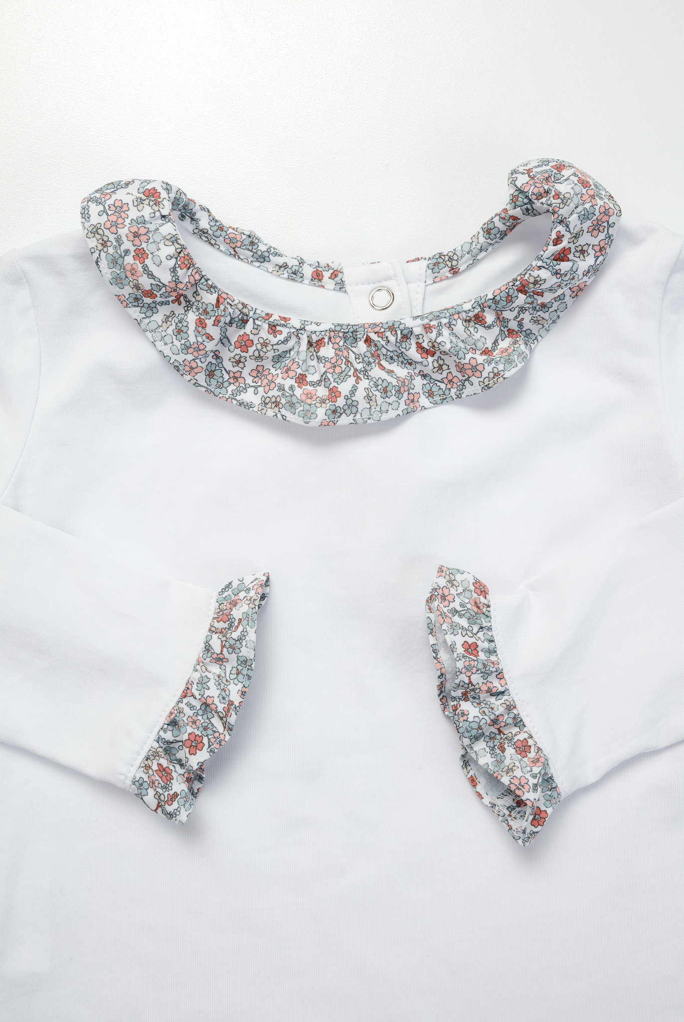 Body Matilda con Flores Rosadas